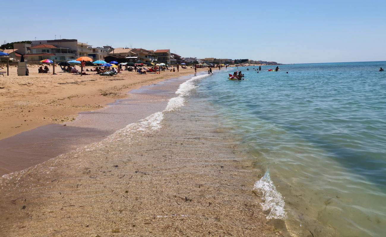 Photo de Spiaggia di Caucana avec sable beige de surface