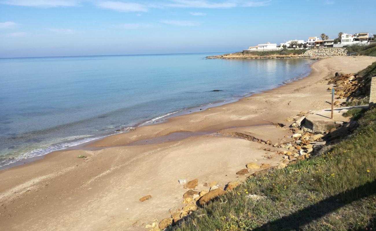 Photo de Baia Dorica avec sable lumineux de surface