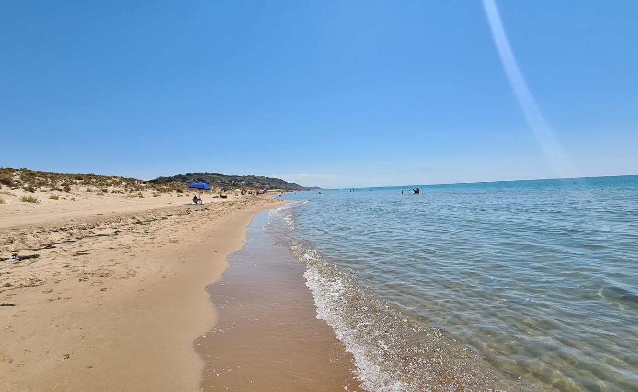Photo de Spiaggia Roccazzelle avec sable beige de surface