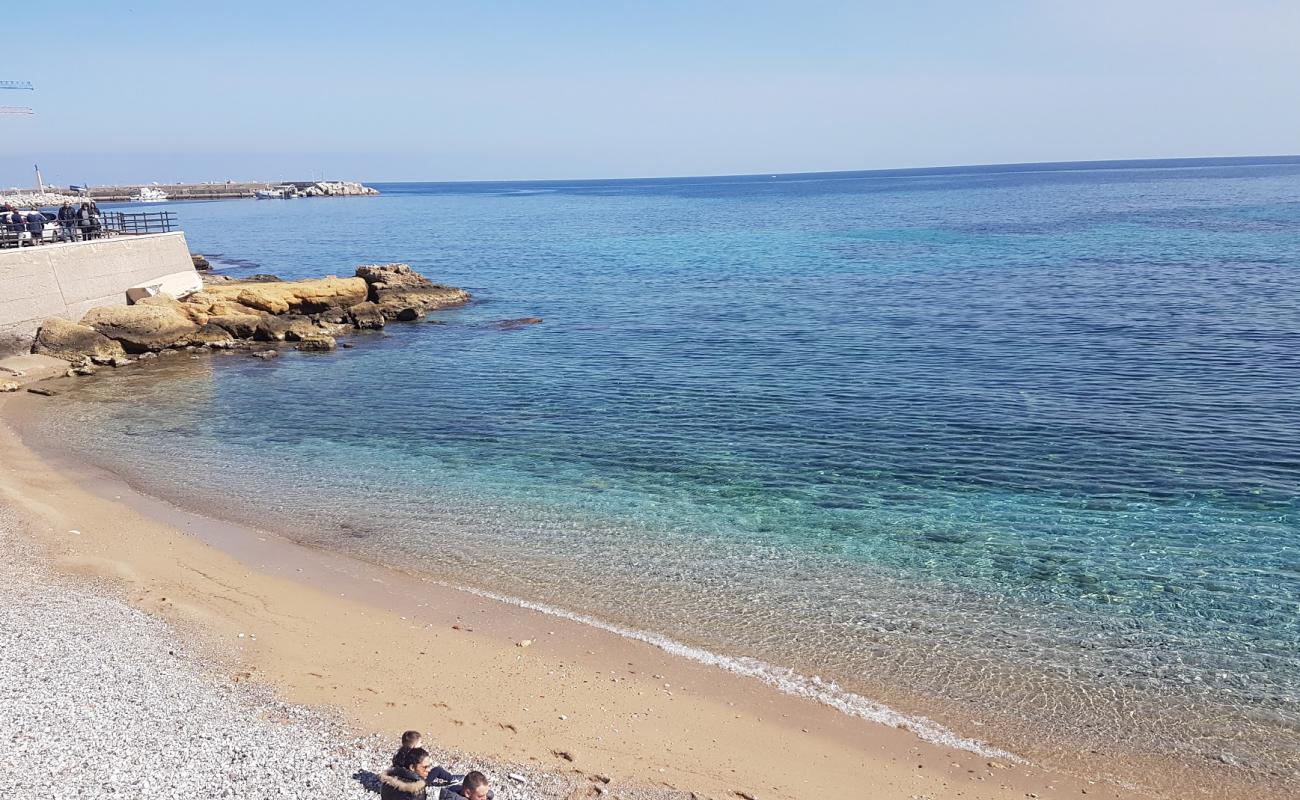 Photo de Spiaggia Olivella avec sable beige & galets de surface