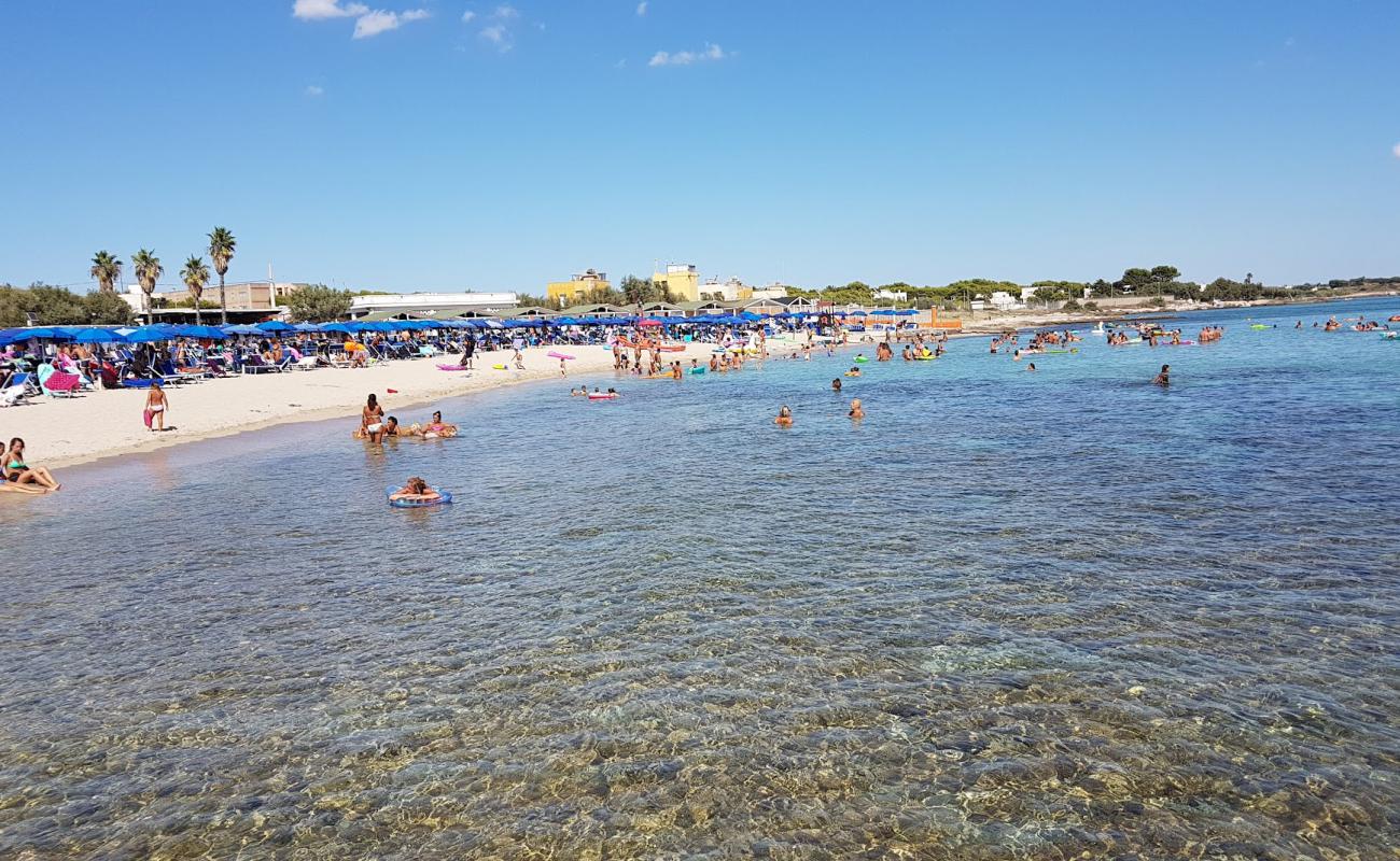 Photo de Spiaggia Ufficiali avec sable brun avec roches de surface