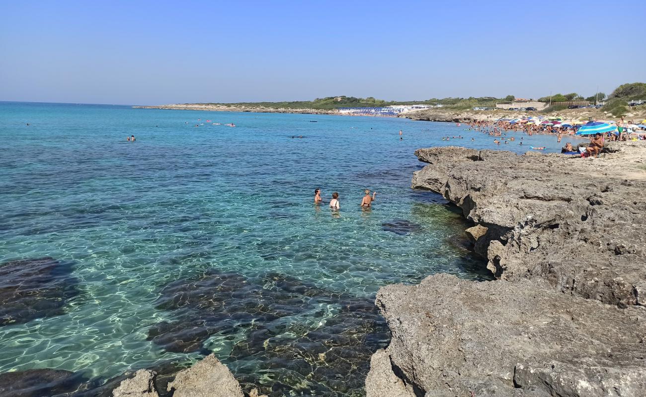 Photo de Plage de Tramontone avec sable brun de surface