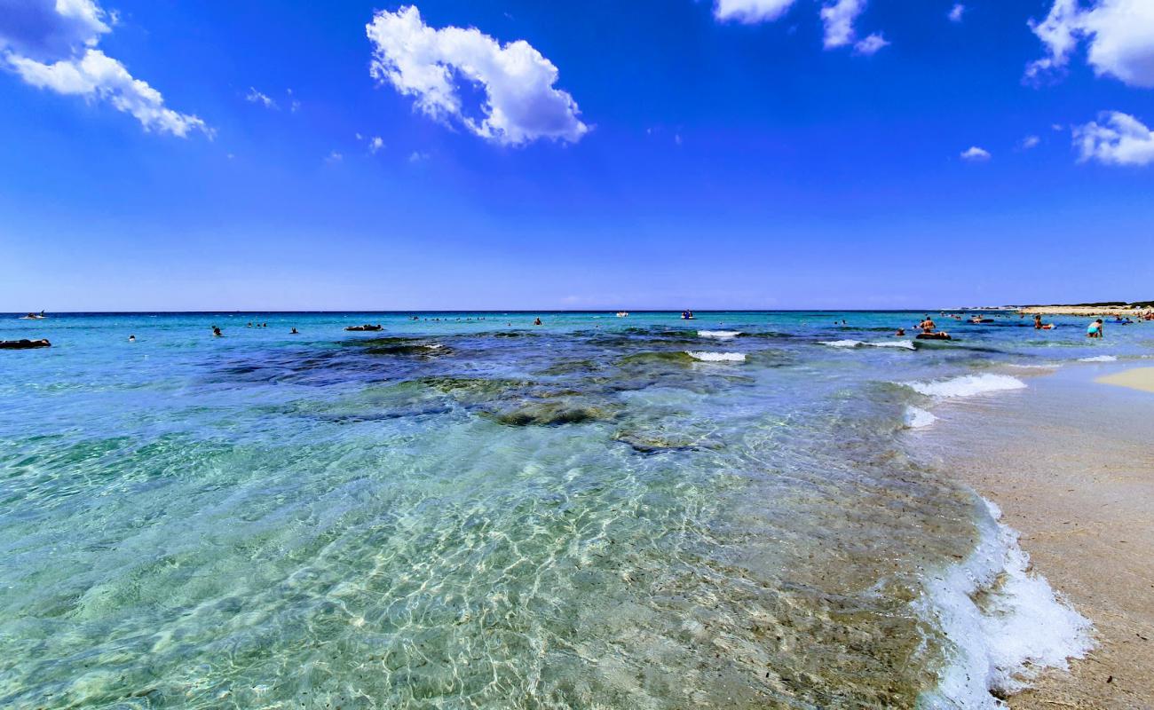 Photo de Conca del Sole avec sable fin et lumineux de surface