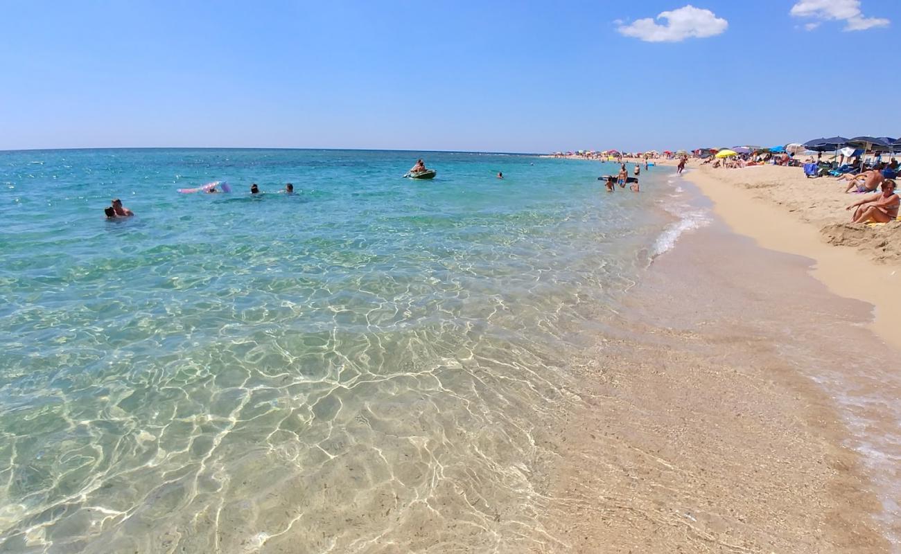 Photo de Spiaggia di Borraco avec sable lumineux de surface