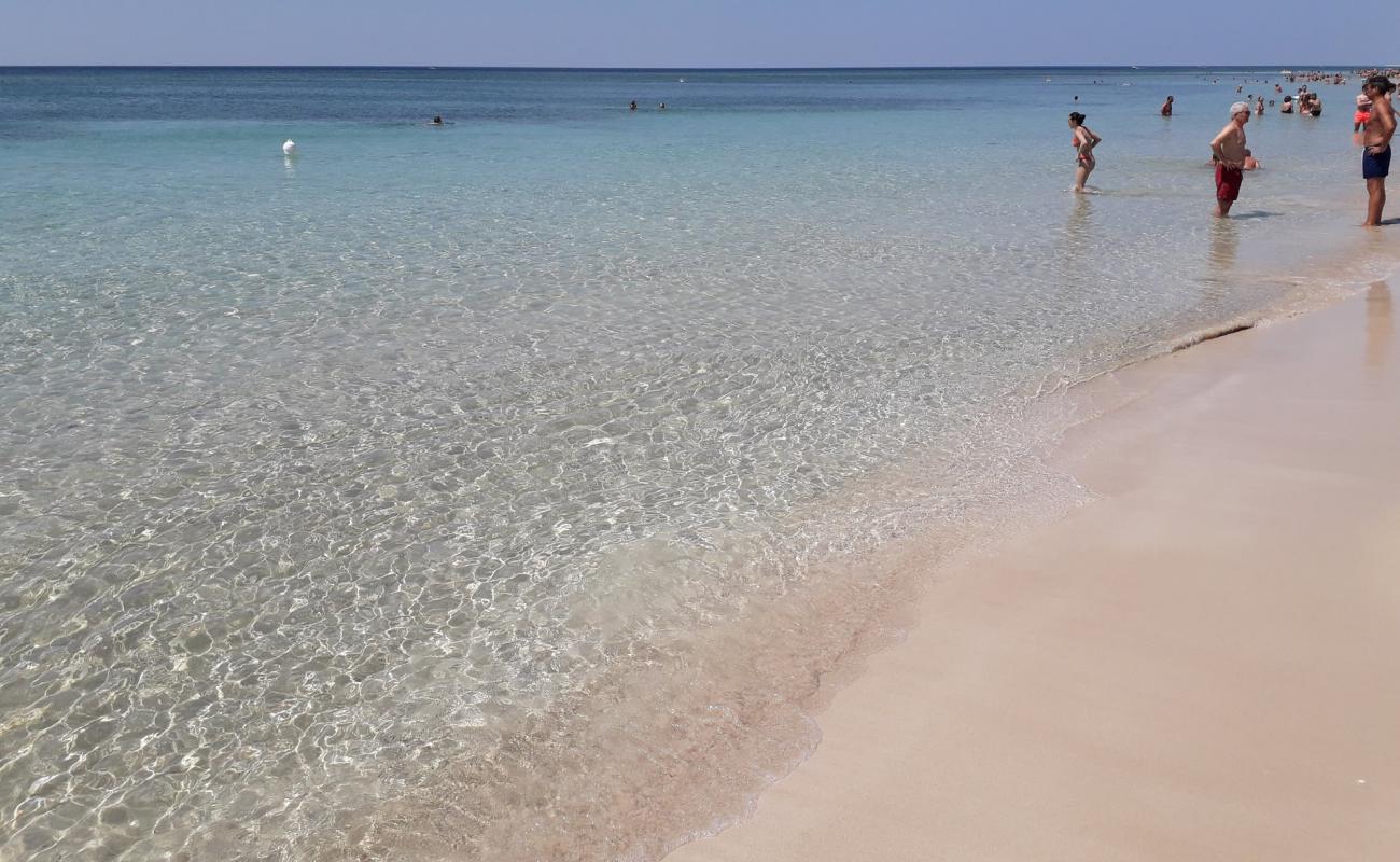 Photo de Spiaggia di Campo dei Messapi avec sable lumineux de surface