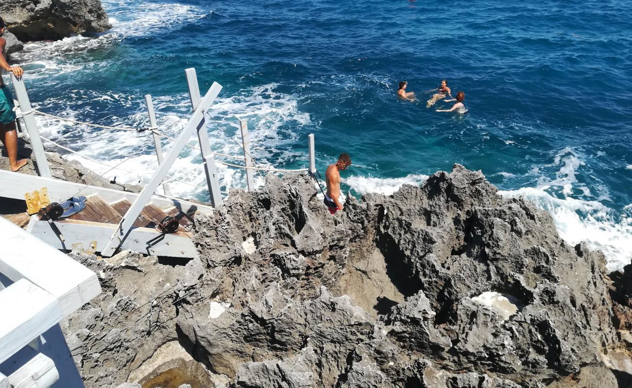 Photo de Spiaggia dei Porticelli avec rocky shore de surface