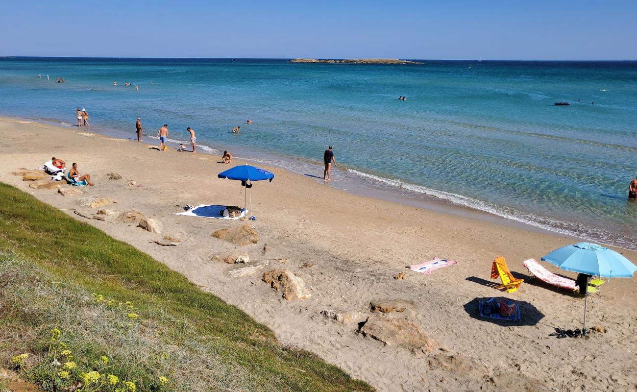 Photo de Posticeddu beach avec sable fin et lumineux de surface