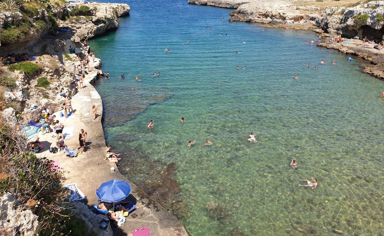 Photo de Cala Incine beach avec galets beige de surface