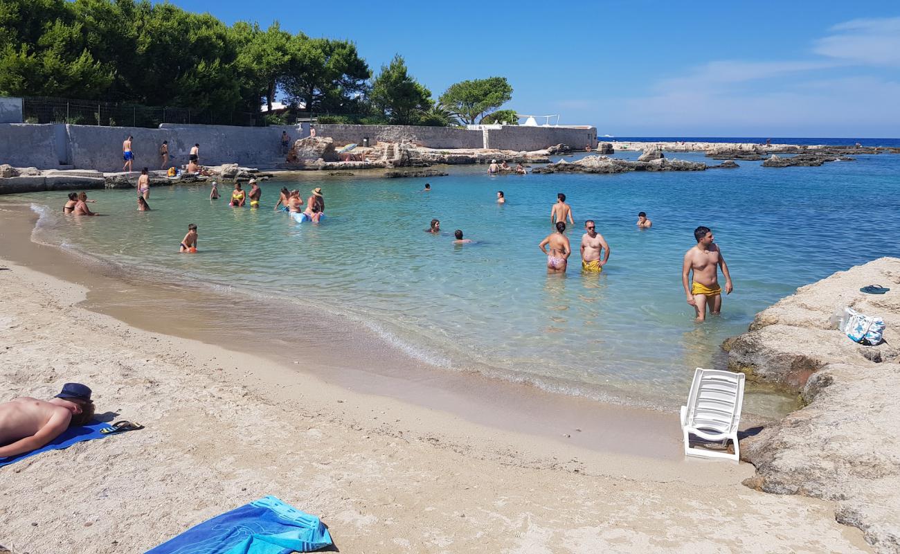 Photo de Porto Cavallo beach avec sable beige de surface