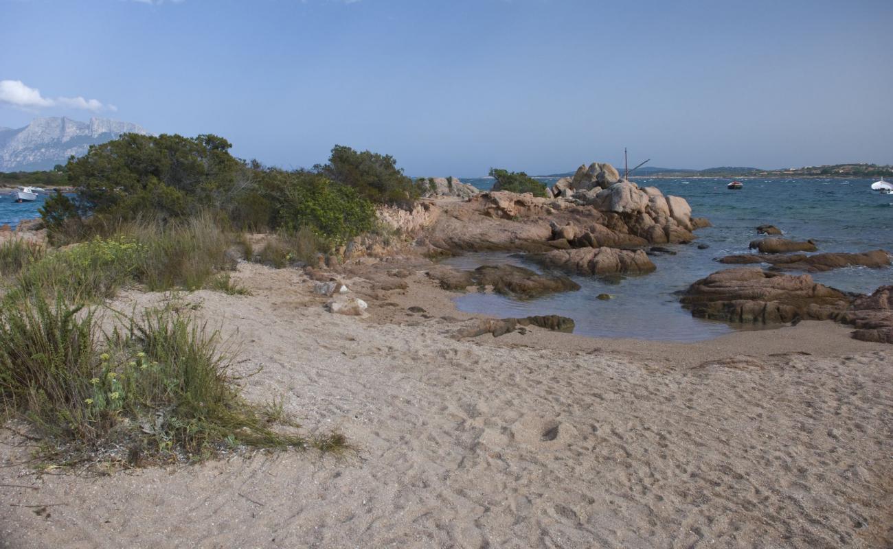 Photo de Pescatore Beach avec sable brun de surface