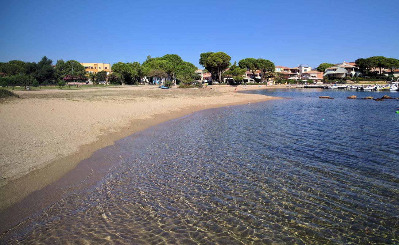 Photo de Porto San Paolo avec sable brun de surface