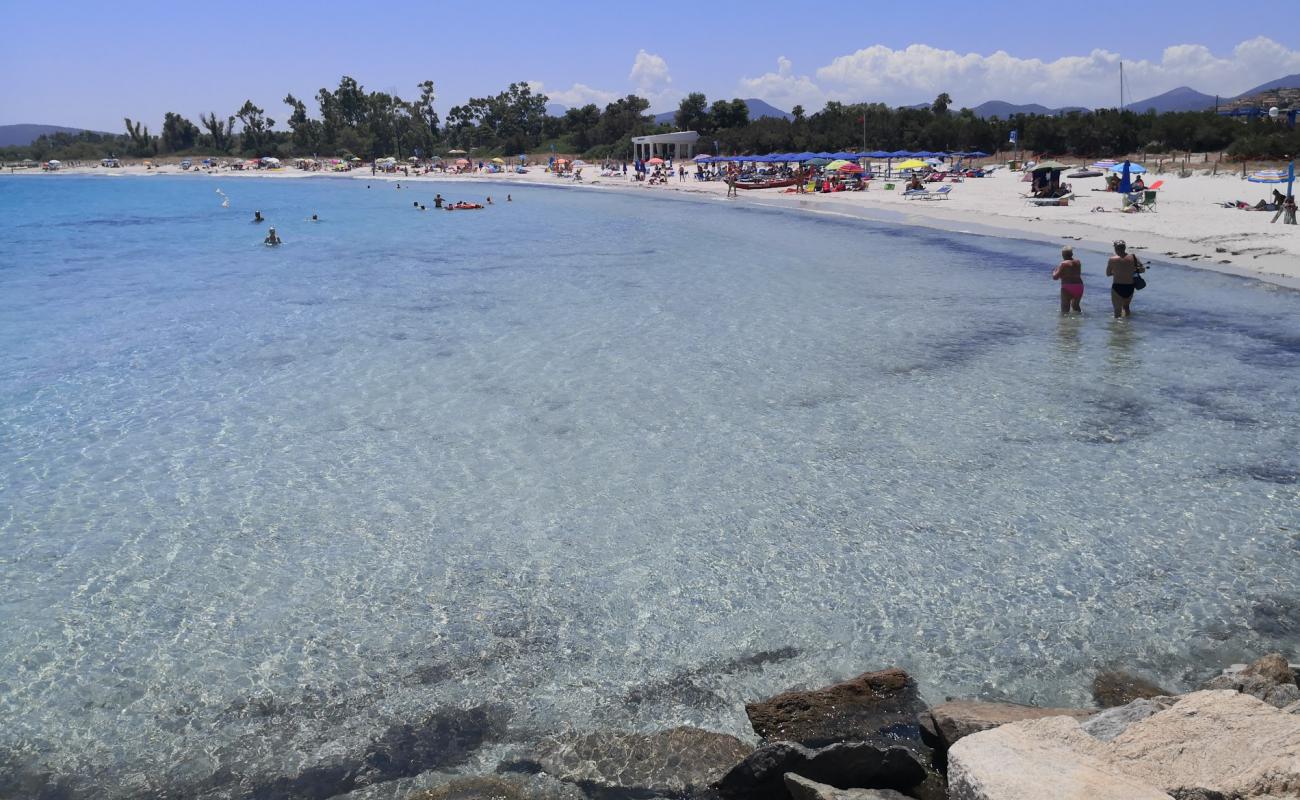 Photo de Porto Ottiolu avec sable fin et lumineux de surface