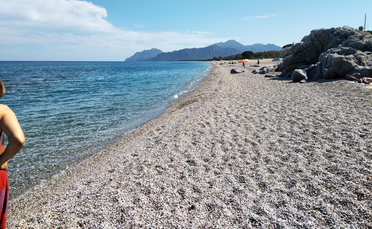 Photo de Spiaggia Sa Marina avec sable beige & galets de surface