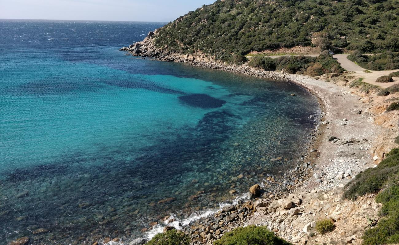 Photo de Cala Regina avec galets beige de surface