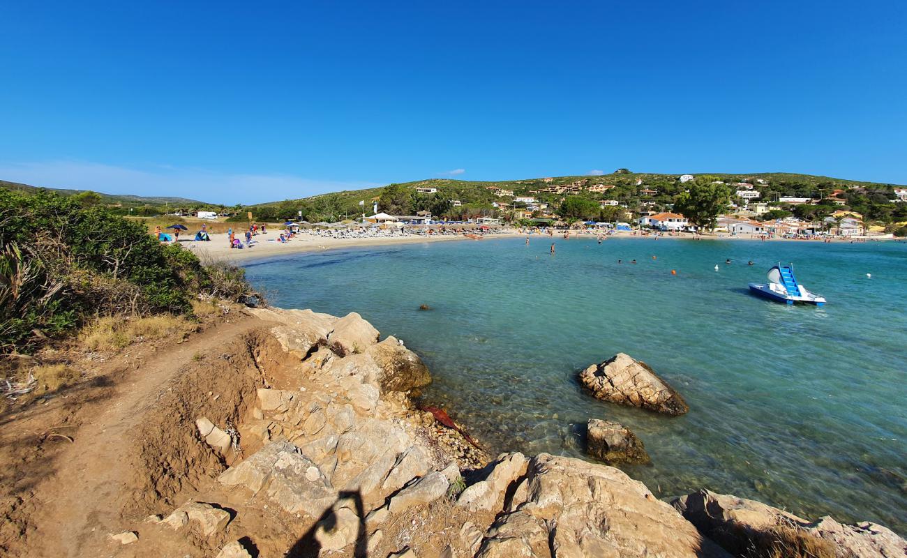 Photo de Plage de Maladroxia avec sable fin et lumineux de surface