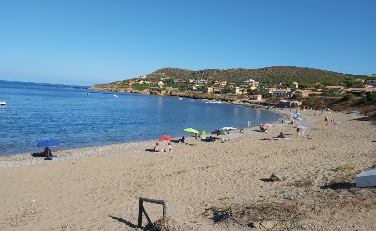 Photo de Porto Palma Beach avec sable beige & galets de surface