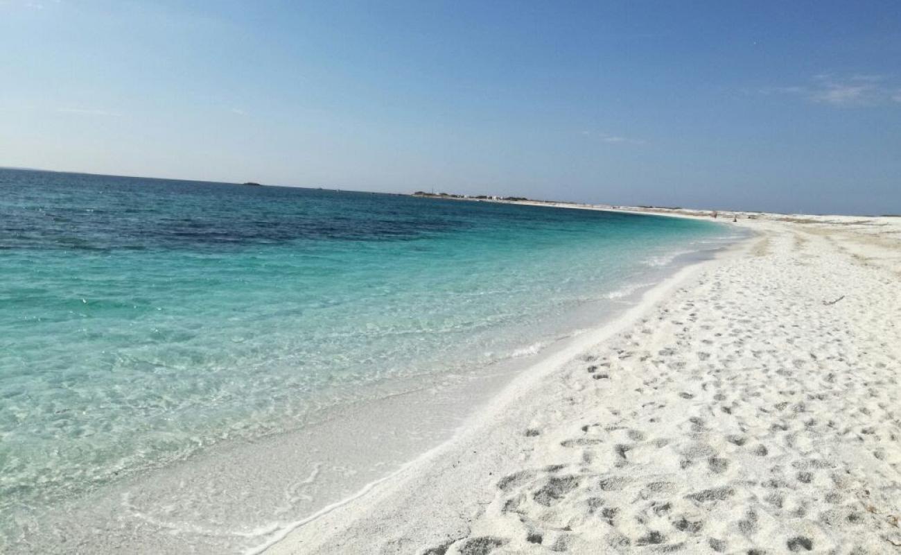 Photo de Spiaggia di Portu S'Uedda avec sable lumineux de surface