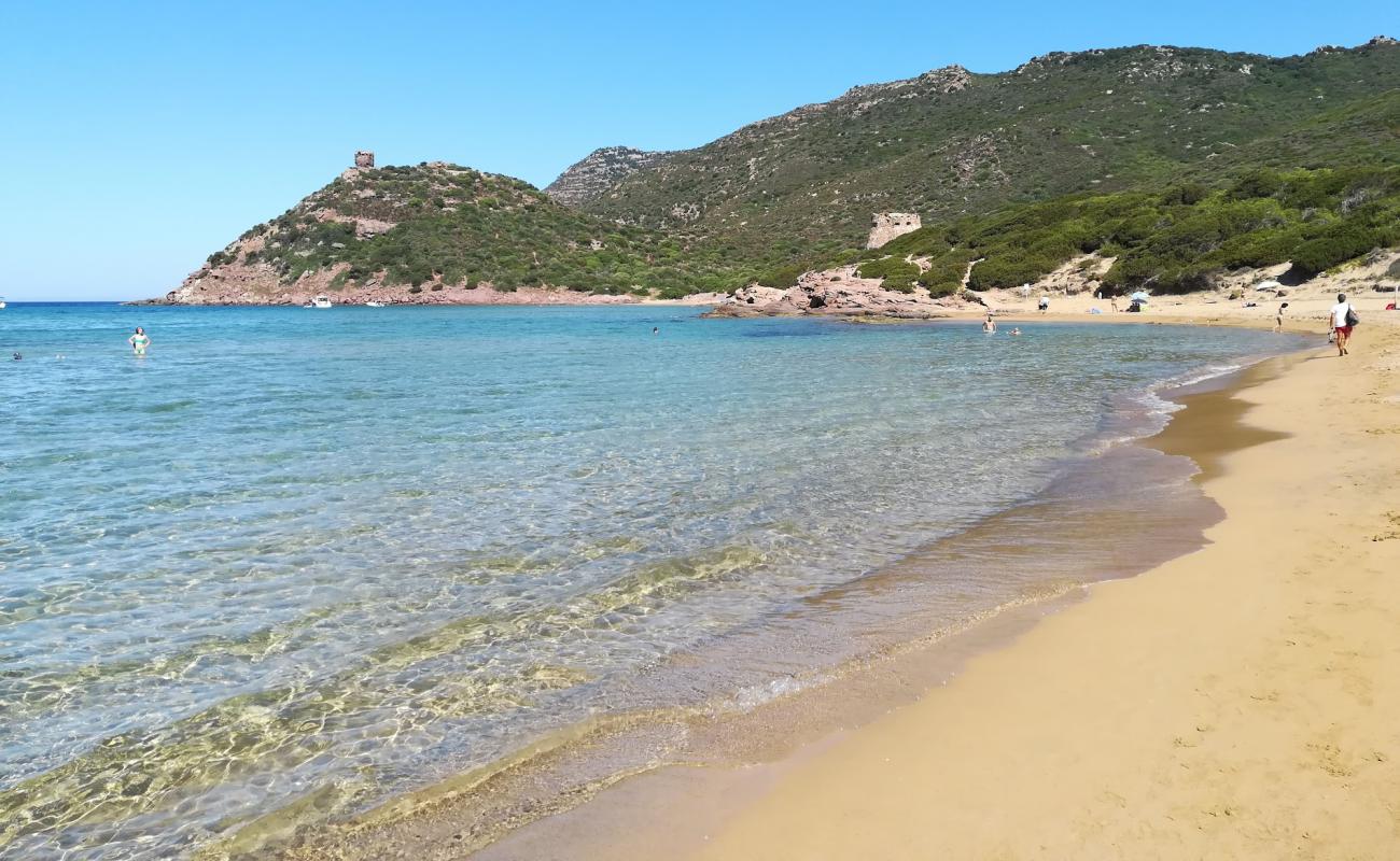 Photo de Spiaggia di Porto Ferro avec sable beige de surface