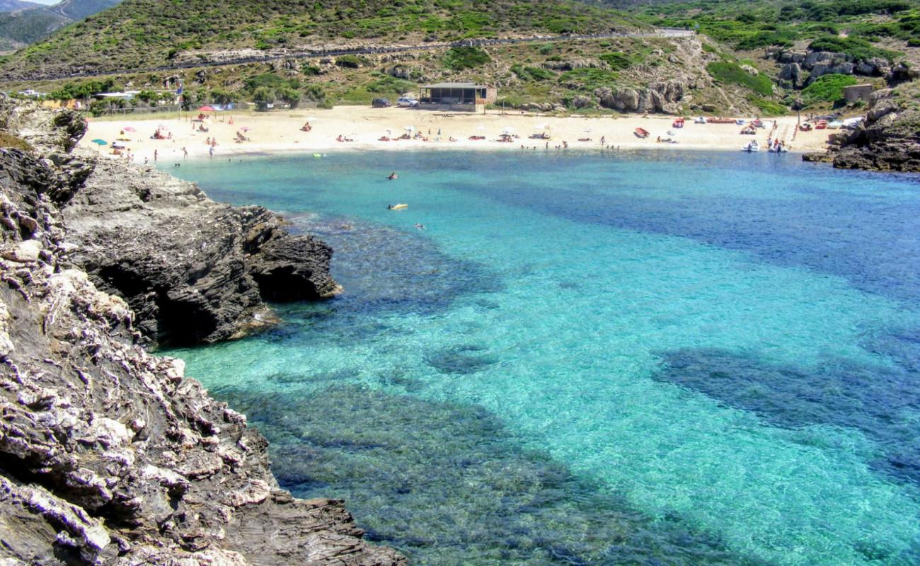 Photo de Porto Palmas avec sable lumineux de surface