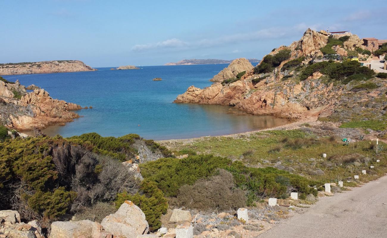 Photo de Spiaggia Punta Lunga avec caillou brun de surface