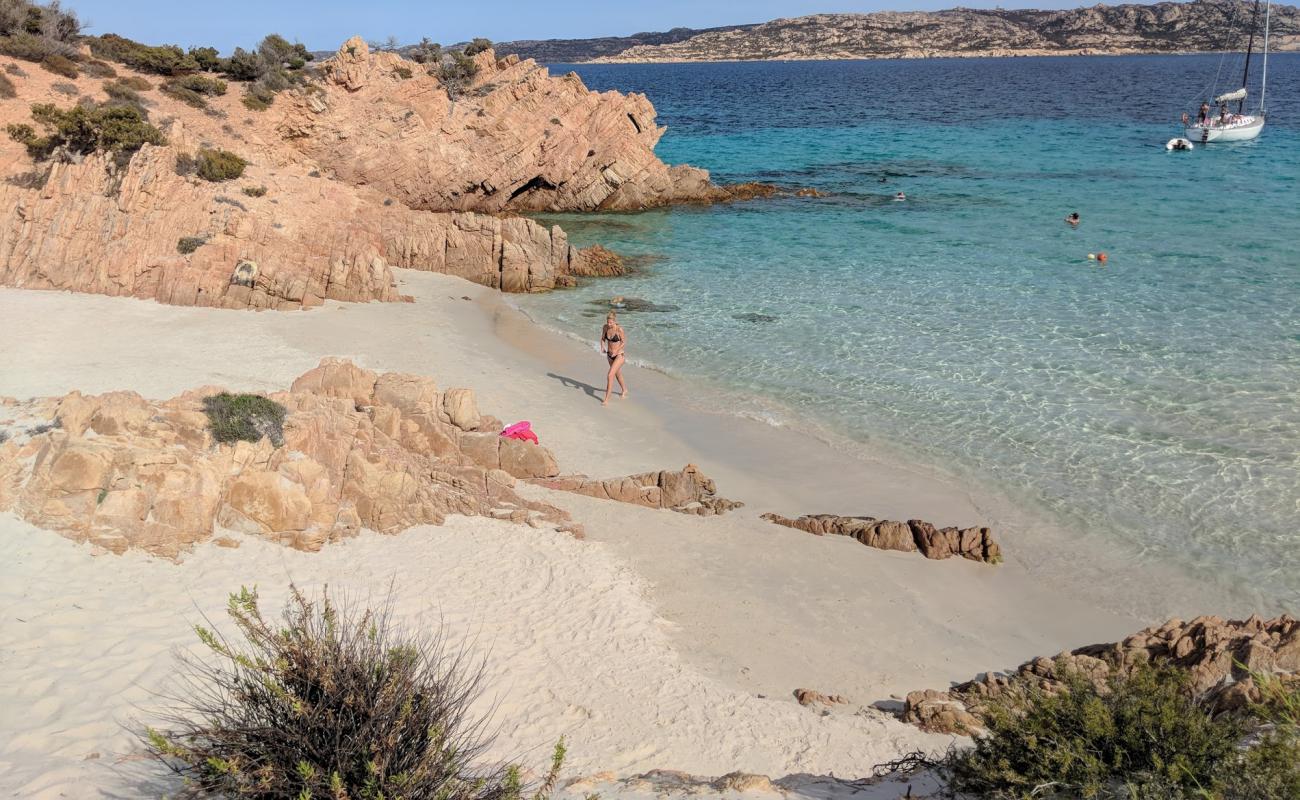 Photo de Plage de Cala Soraya avec sable beige fin de surface