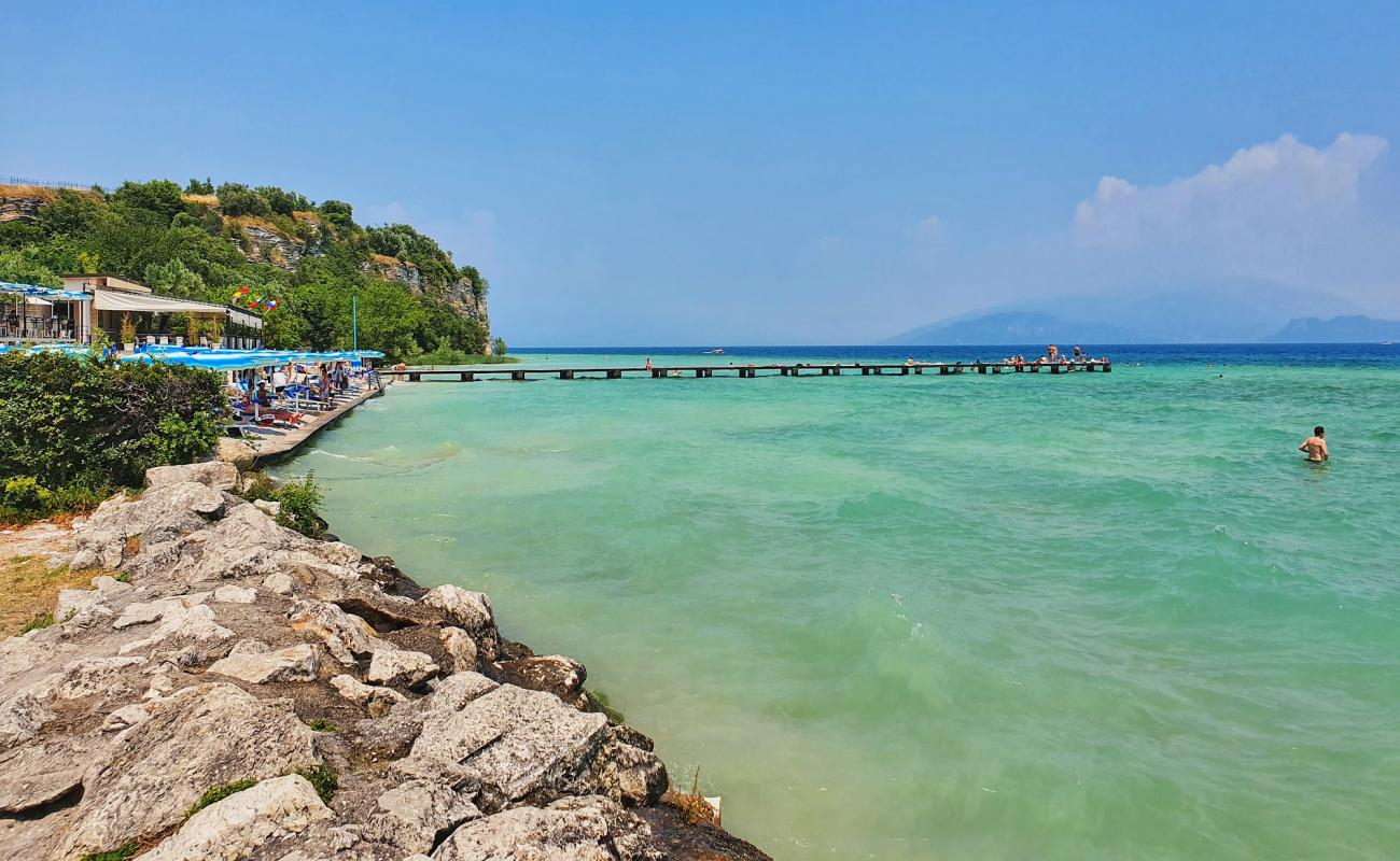Photo de Spiaggia Lido delle Bionde avec rocky shore de surface