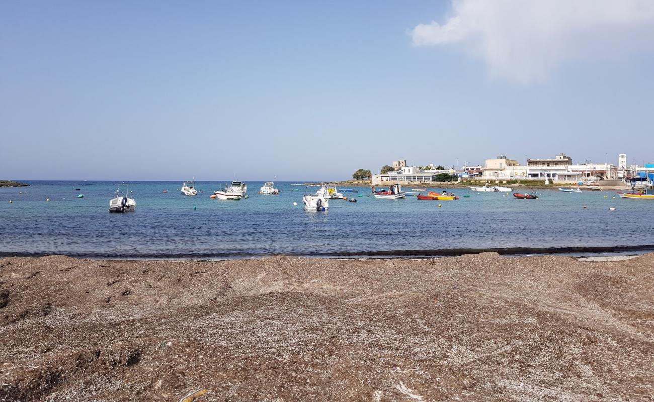 Photo de Spiaggia di Torre Colimena avec caillou fin clair de surface