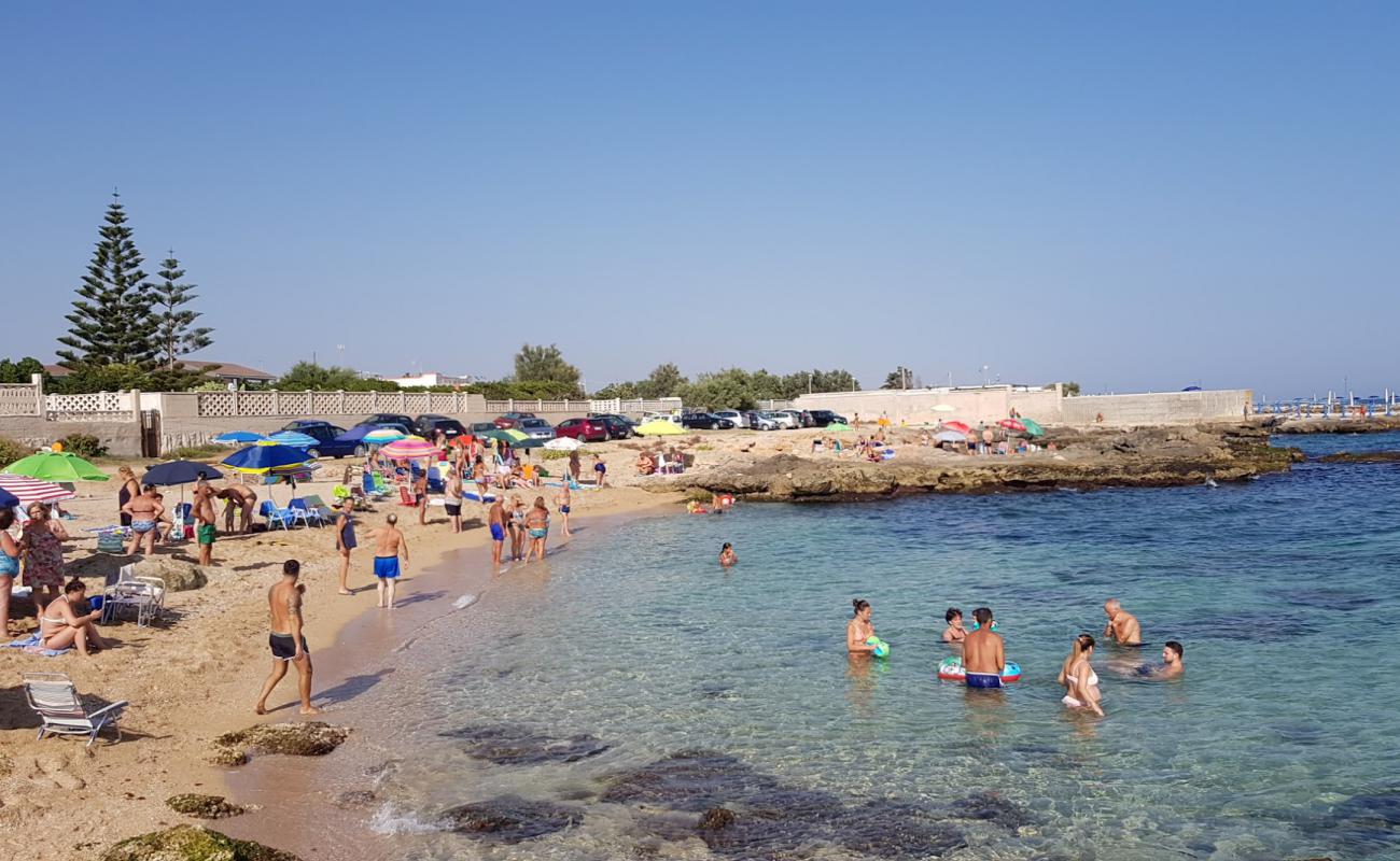 Photo de Spiaggia Torre a Mare avec sable lumineux de surface