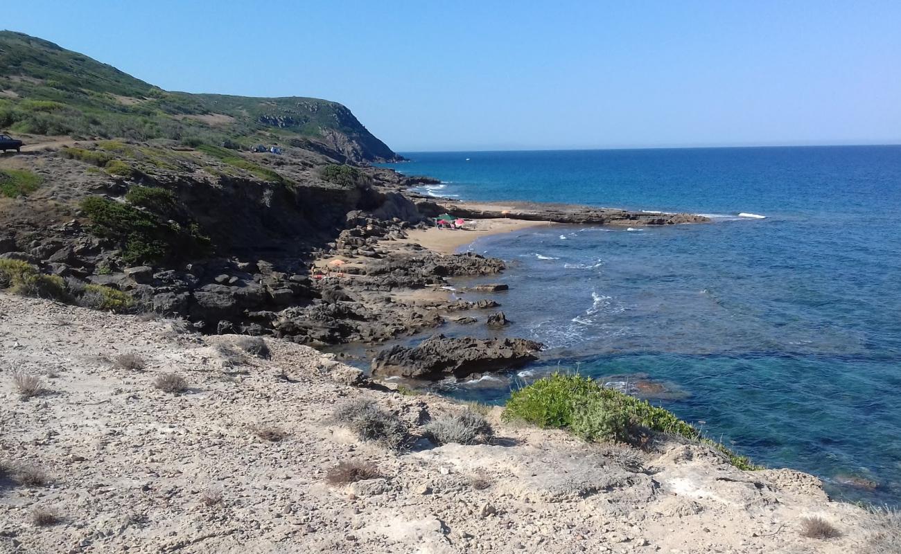 Photo de Cala dello Scoglio Rosso avec roches de surface