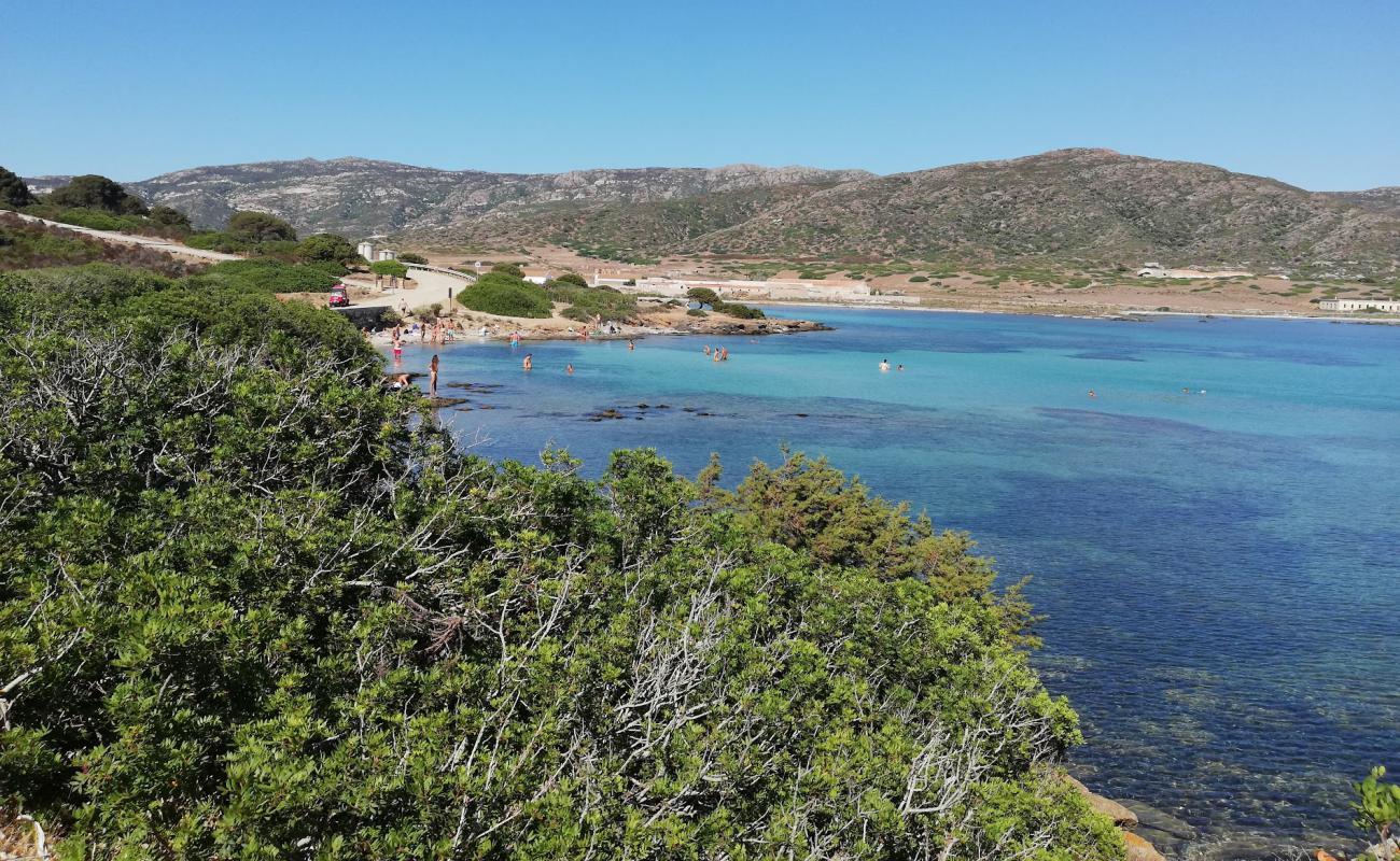 Photo de Cala dell'Ossario avec sable beige de surface