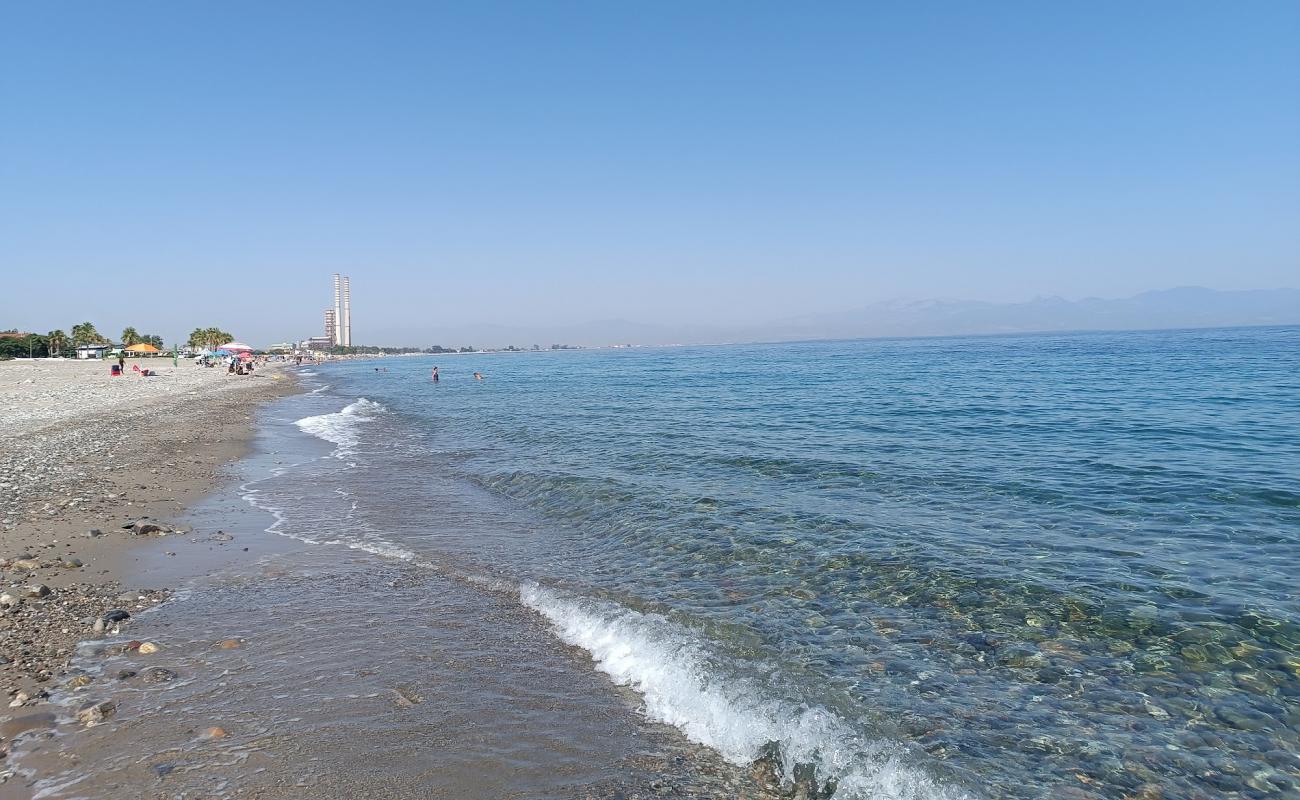 Photo de Lido Azzurro Murano avec sable gris & rochers de surface
