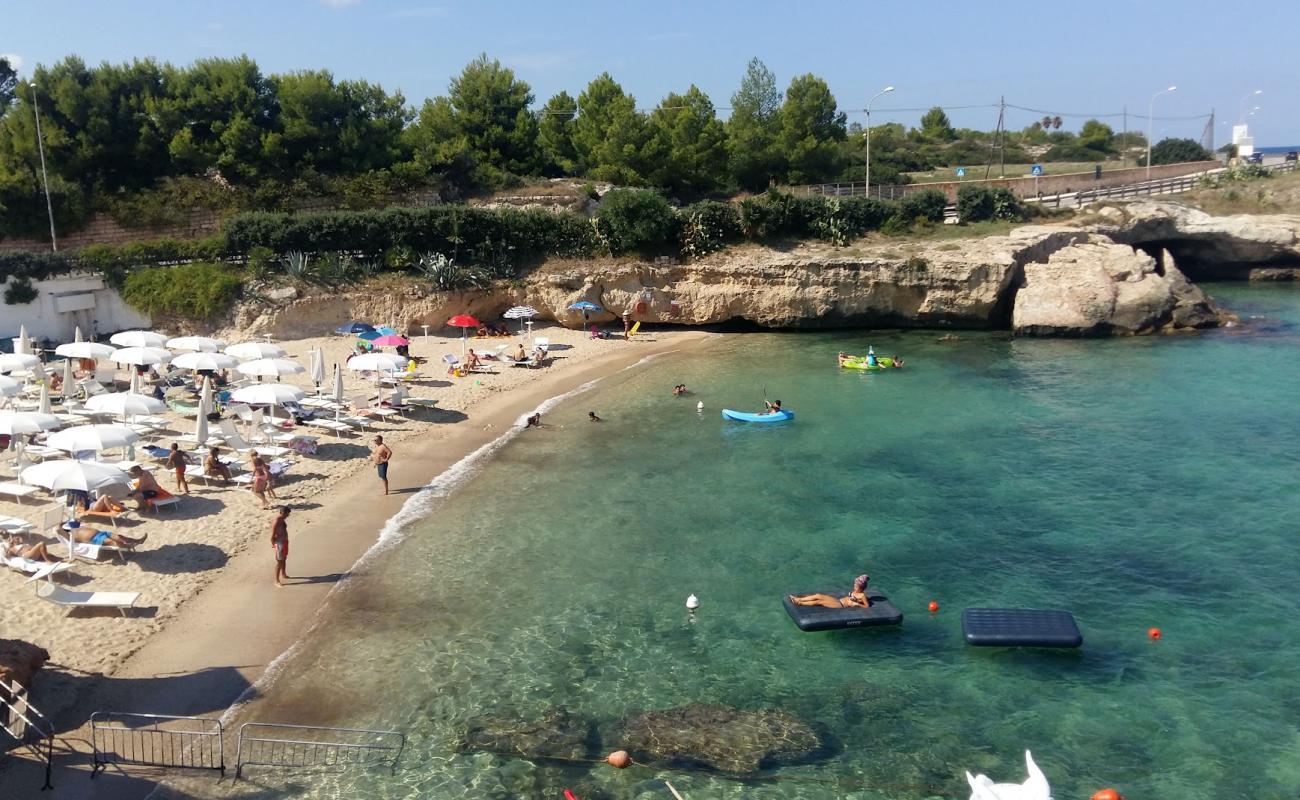 Photo de Porto Giardino Beach avec sable lumineux de surface