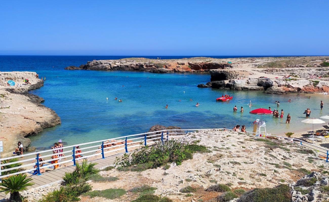 Photo de Cala Paradiso avec sable lumineux de surface