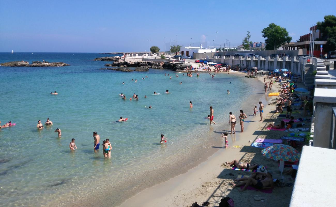 Photo de Cala Porta Vecchia Beach avec sable beige de surface