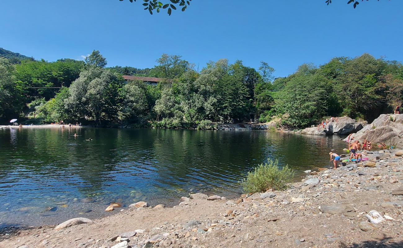 Photo de Santino Beach avec terrain rocheux de surface