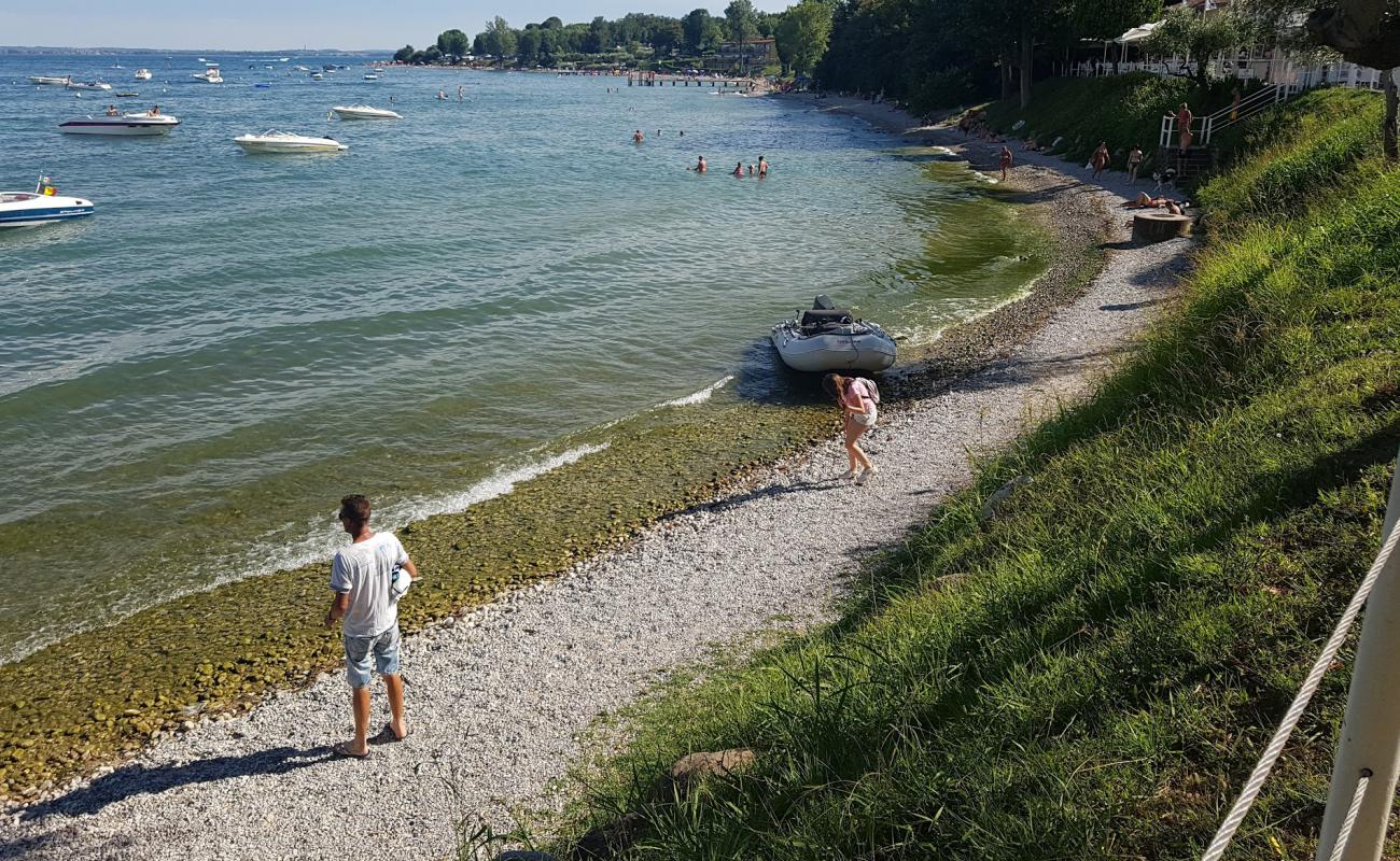 Photo de Baia Bianca Beach avec galets gris de surface