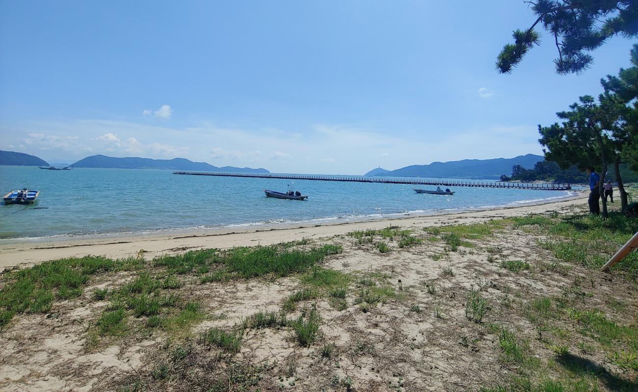 Photo de Sagumi Beach avec sable beige de surface