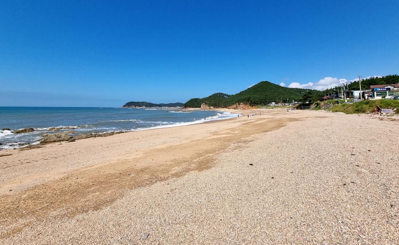 Photo de Padori Beach avec caillou fin clair de surface