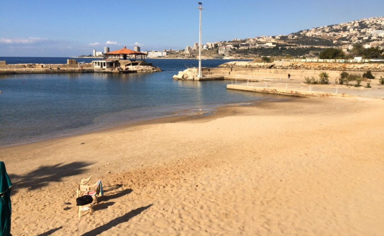 Photo de Green Beach avec sable beige de surface