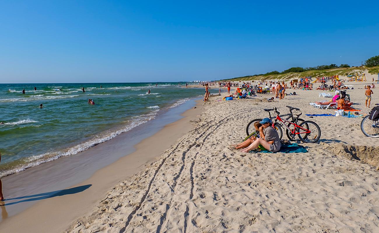 Photo de Smiltynes beach avec sable beige fin de surface