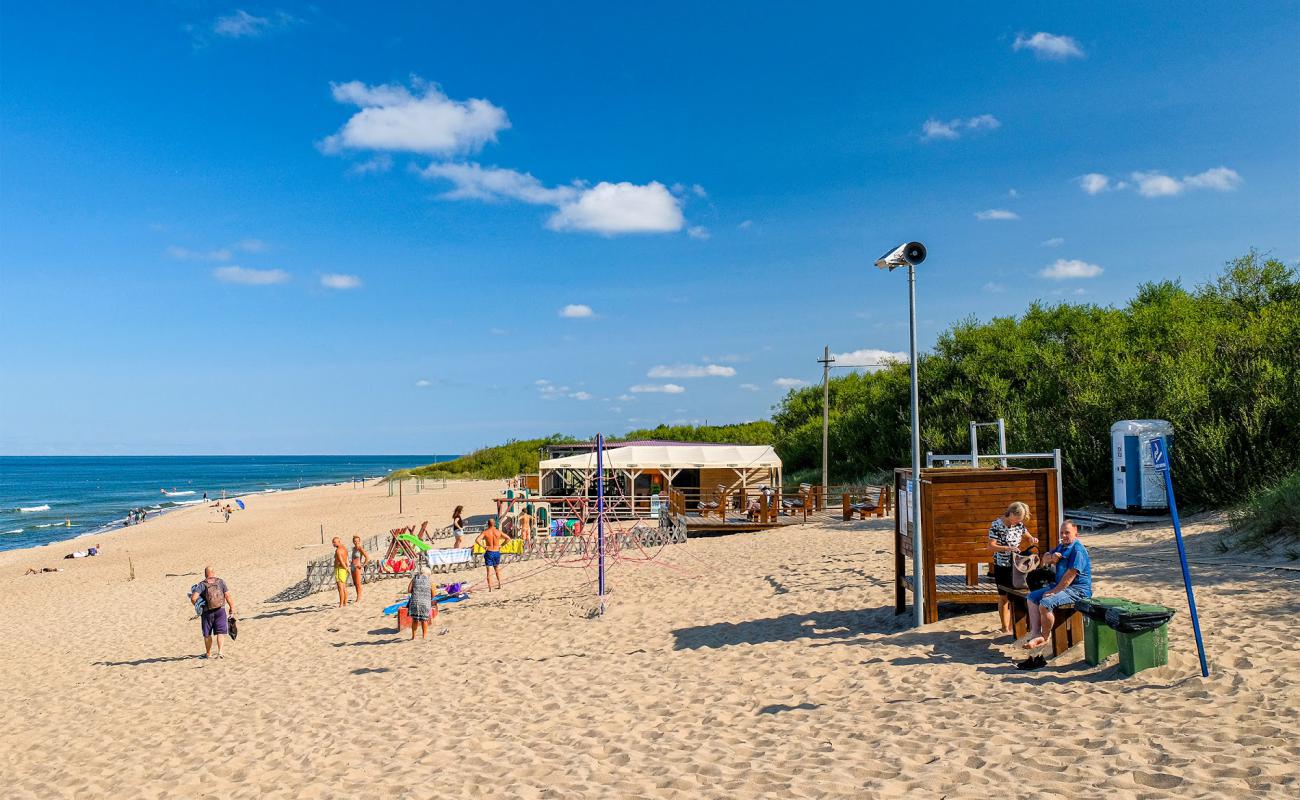 Photo de Melnrage Beach avec sable lumineux de surface