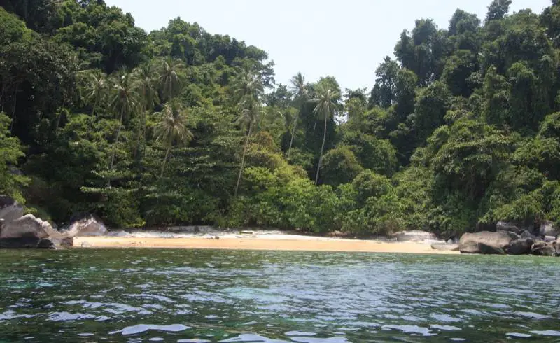 Photo de Genting Bay avec sable blanc de surface
