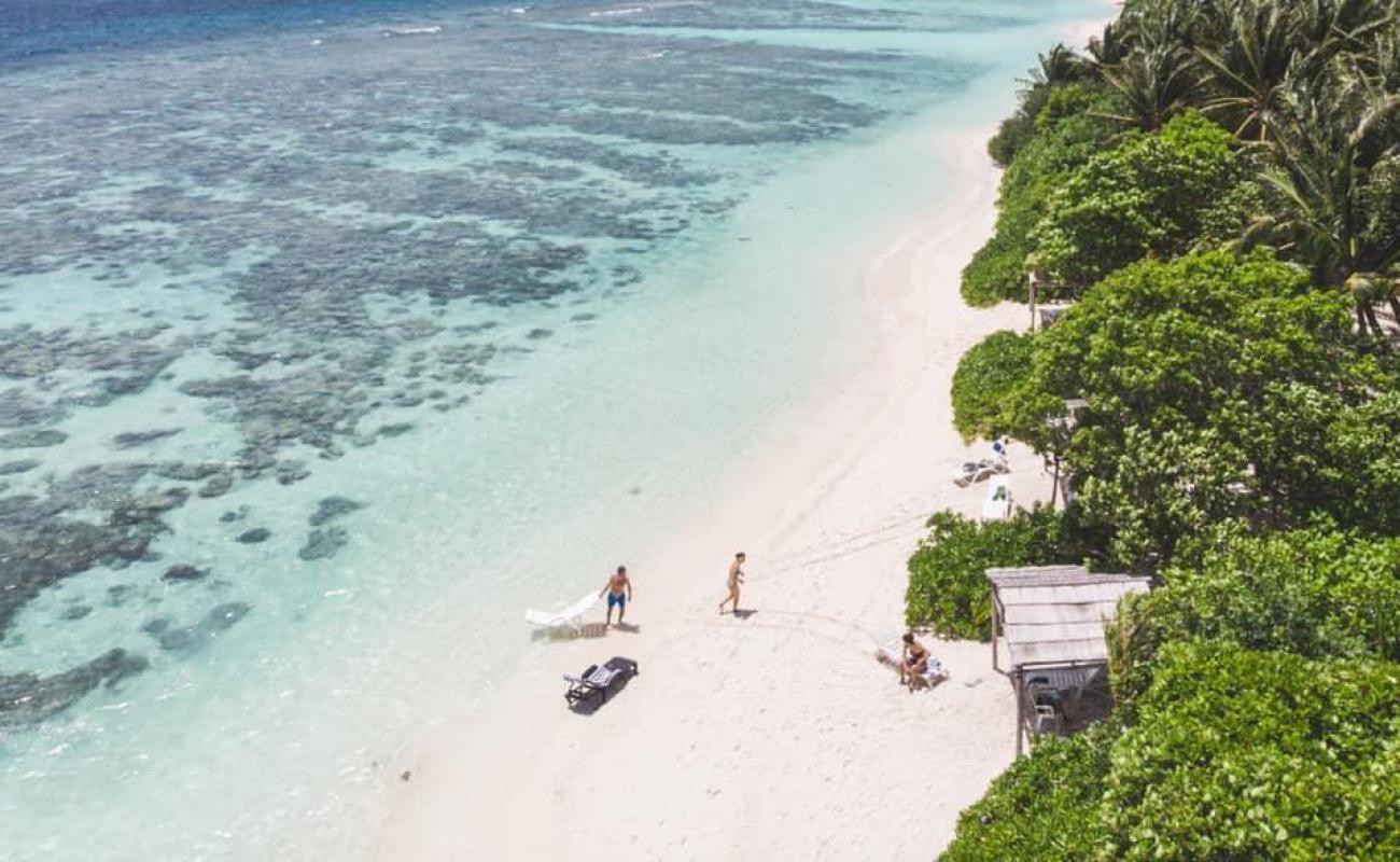 Photo de Plage de Plumeria avec sable fin blanc de surface