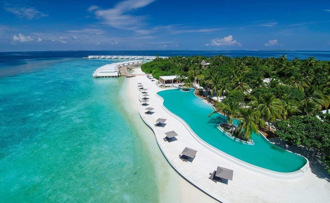 Photo de Plage de l'île Amilla Fushi avec sable fin blanc de surface