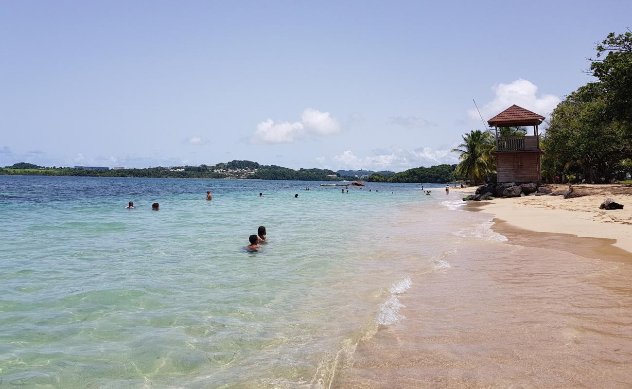 Photo de Plage de Trinité avec sable lumineux de surface