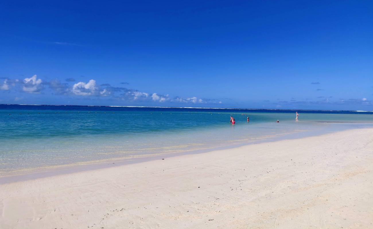 Photo de Quatre Cocos Beach avec sable blanc de surface