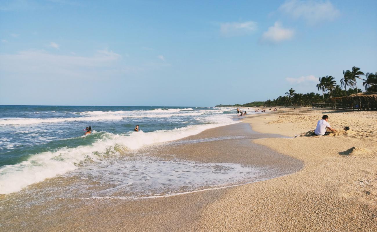 Photo de Playa Chaparrales avec sable beige de surface