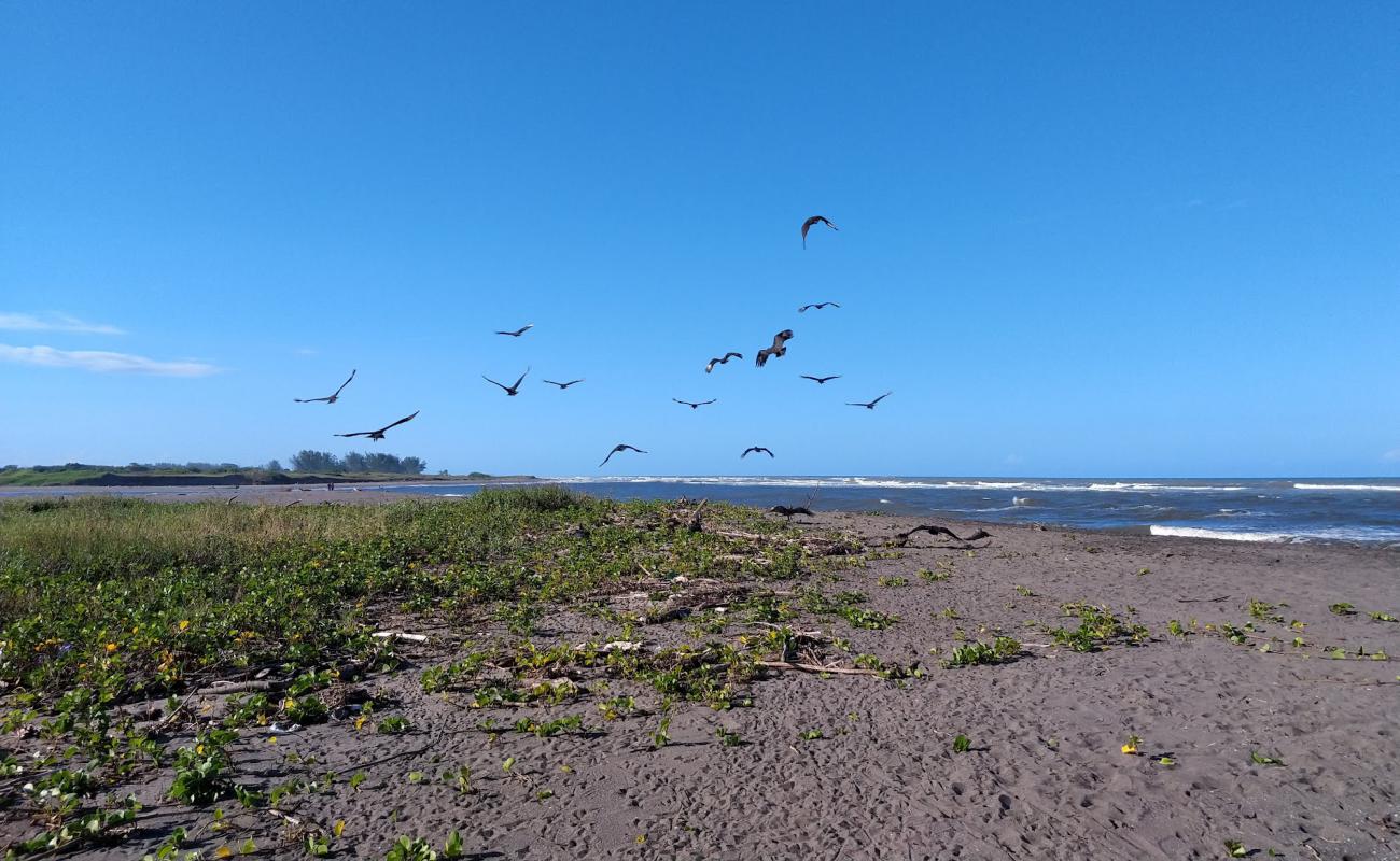 Photo de Playa El Raudal avec sable beige de surface
