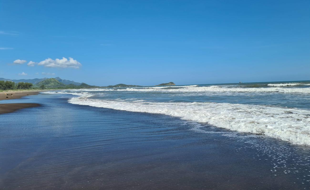 Photo de Playa Farallon avec sable beige de surface