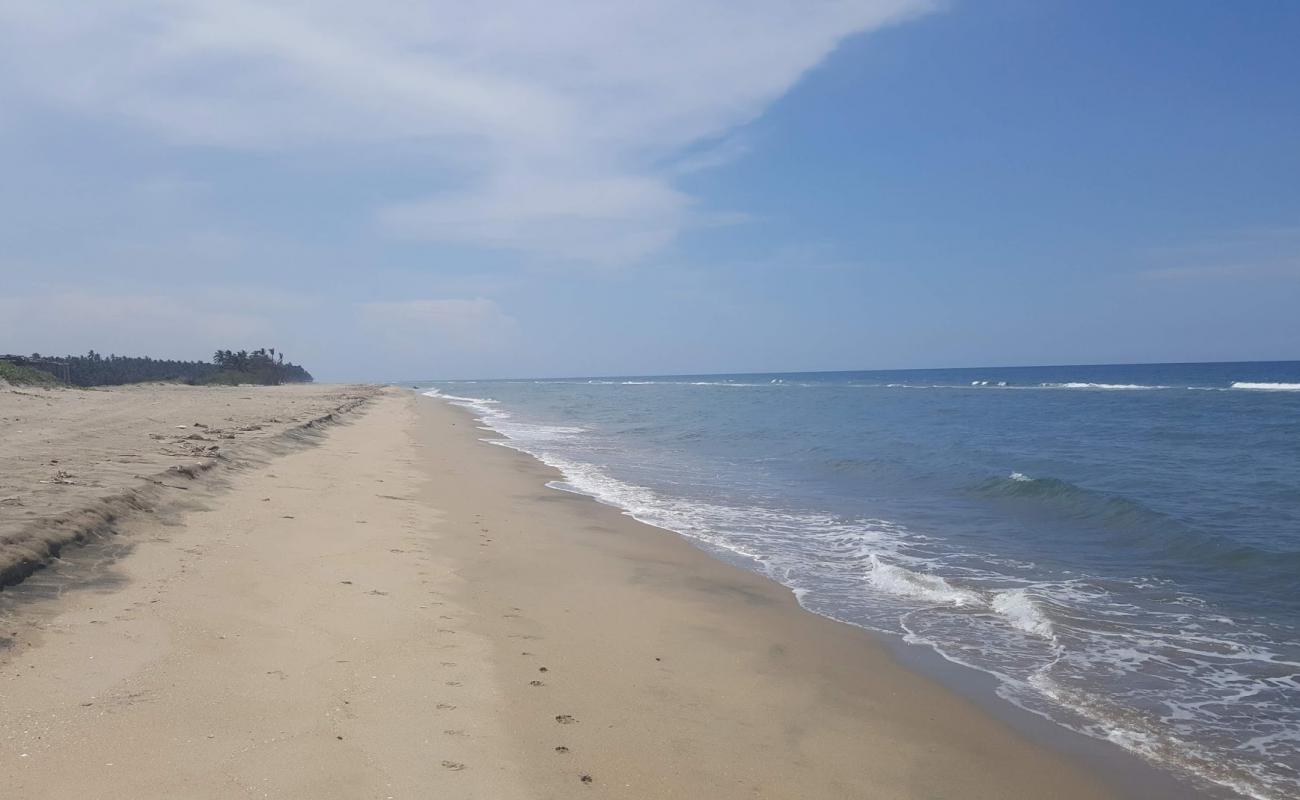 Photo de Tupilco Beach avec sable beige de surface
